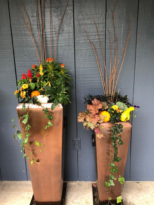 Tall, metal garden planters. Set of 2 created from stainless steel with antique copper finish. Can be used indoors or outdoor