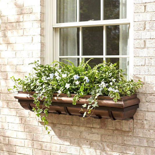 H Potter 48 inch copper antique window box on a brick house