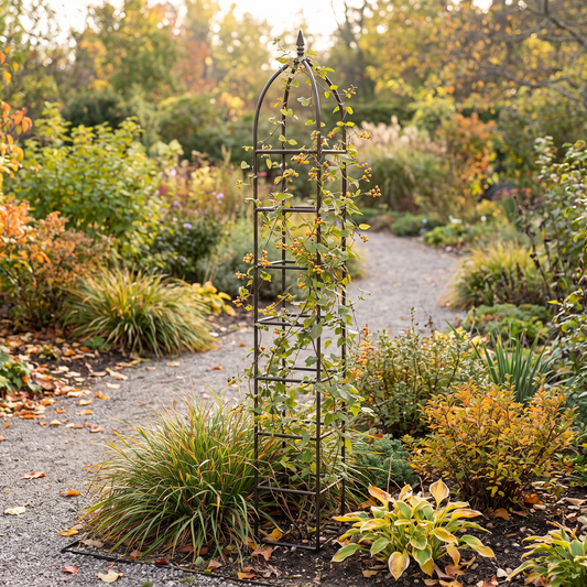h potter metal garden obelisk trellis in autumn garden with fall foliage