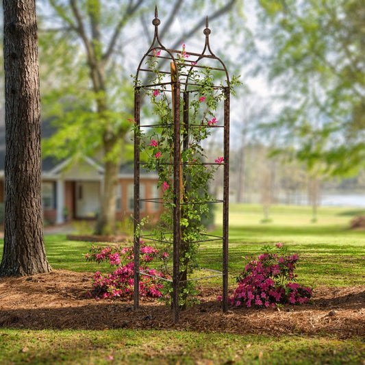 tall h potter classic-garden-obelisk trellis with climbing vine in landscaped garden