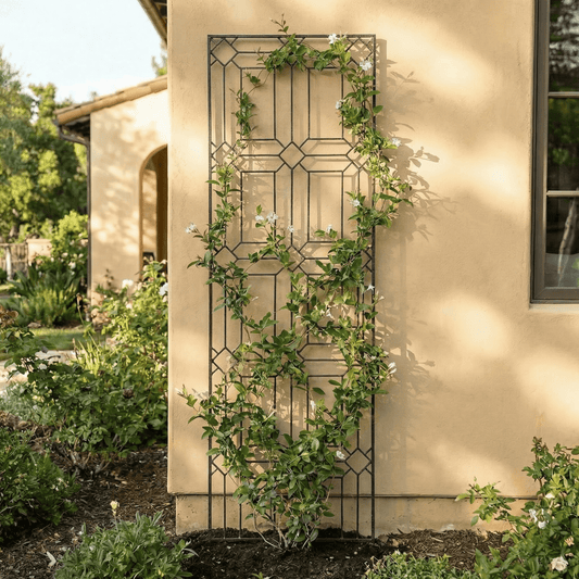 h potter metal garden trellis with vines next to stucco house