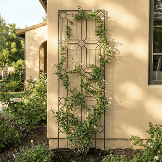 h potter metal garden trellis with vines next to stucco house