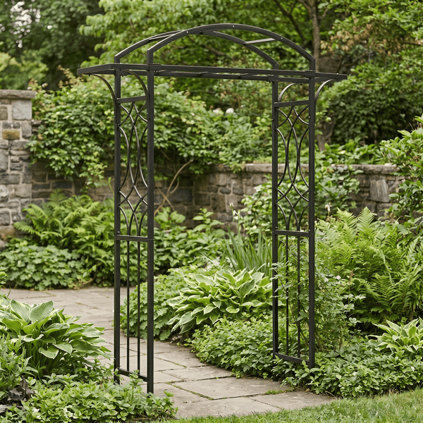 H Potter black metal garden arbor on a stone patio with hostas and ferns