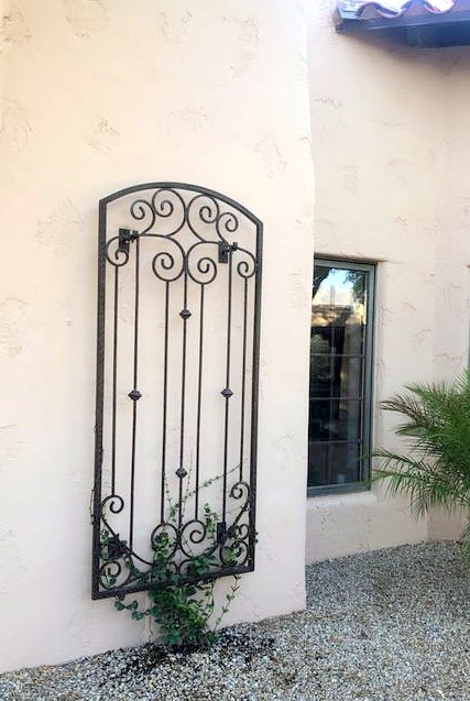 H Potter metal trellis on stucco wall decor