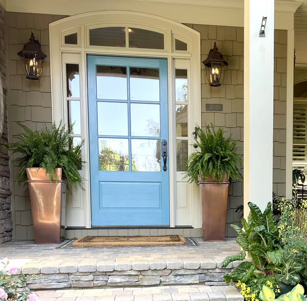 Metal Planters featured outside front door of house