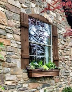 H Potter brand rustic copper stainless steel window boxes plant containers hanging on outside of home with flowers