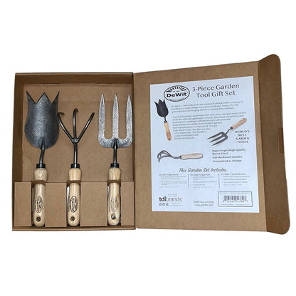 3 piece metal garden tool set tulip trowel, cultivator, and fork in a cardboard box on a white background