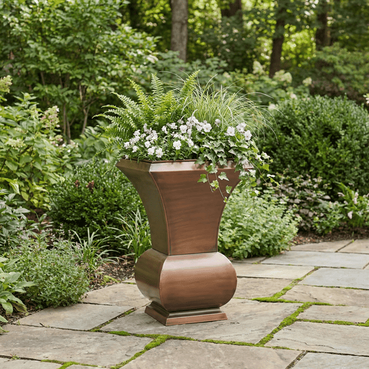 H Potter Biltmore tall copper planter on stone patio