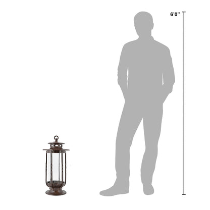 H Potter cast iron hurricane lantern shown next to a 6-foot human silhouette to illustrate size and scale for indoor or outdoor décor.