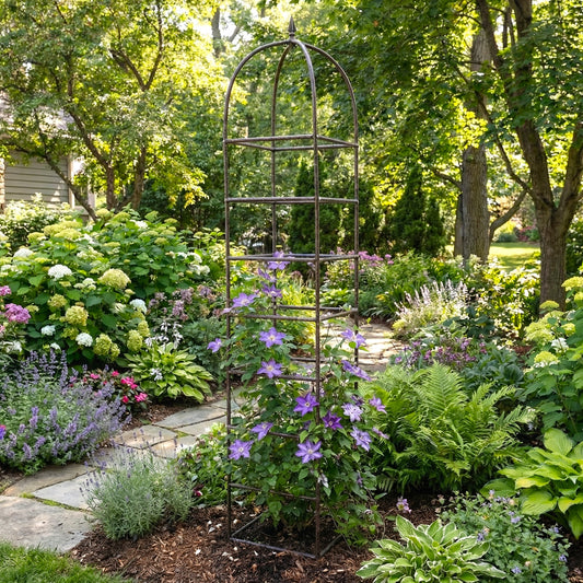 h potter metal garden trellis with clematis in backyard landscape on stone path
