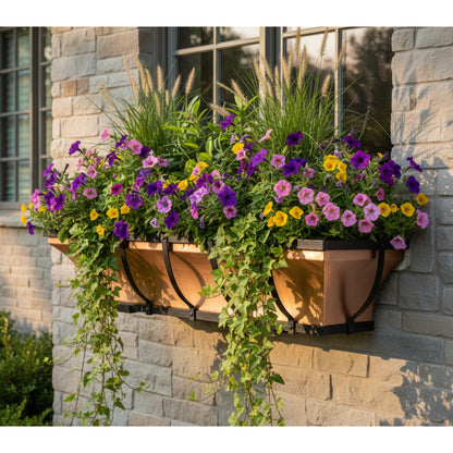 Window box with flowers on a stone wall