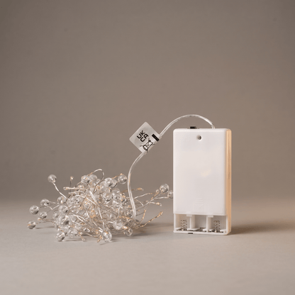 H Potter Crystal Cluster LED String Lights showing 100 battery-operated warm white fairy lights with clear crystal-style decorative beads and battery pack.