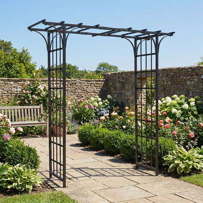 H POTTER eden park garden arbor in a garden setting with stone path and flowers