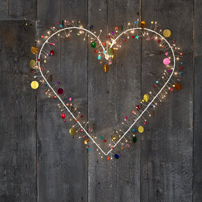 Enchanted Jewel lighted heart wreath, outlined in warm lights with multicoloured beads and gold discs