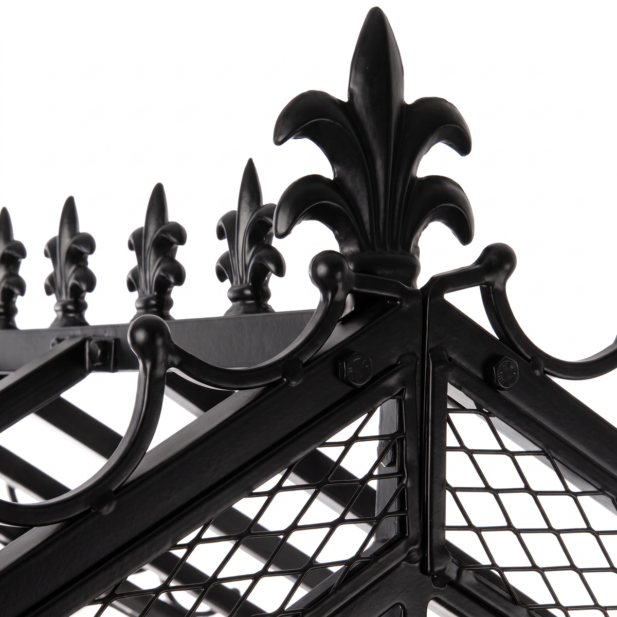 Close-up of decorative fleur-de-lis finials and iron scrollwork on H Potter Marabella black garden arbor