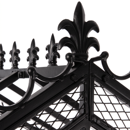 Close-up of decorative fleur-de-lis finials and iron scrollwork on H Potter Marabella black garden arbor