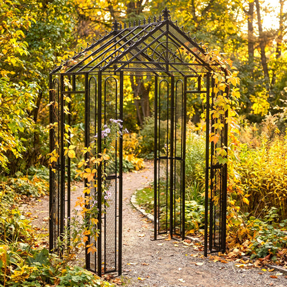 H Potter Marabella black iron garden arbor with climbing vines over an autumn garden pathway