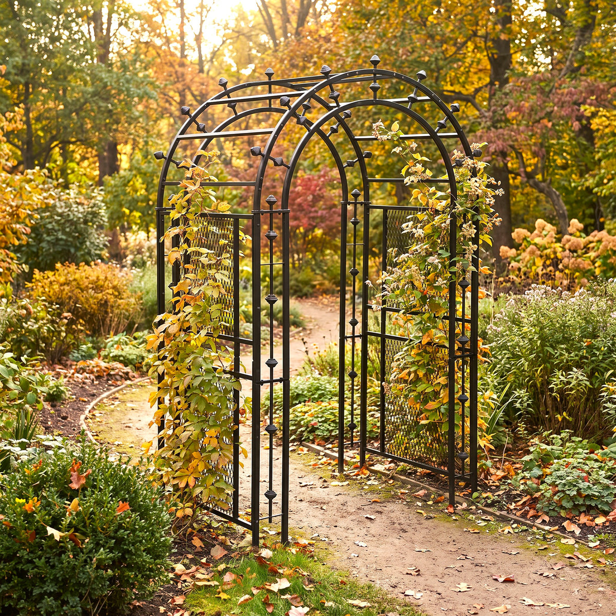H Potter Stratford black garden arbor with climbing vines over an autumn garden pathway