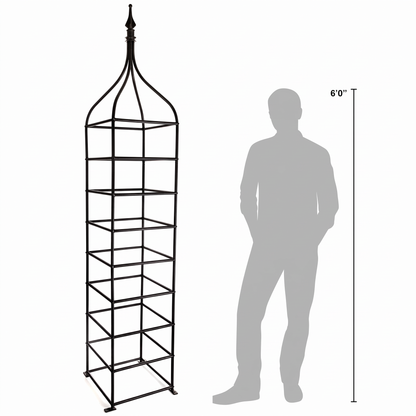 H Potter Clairmont black iron garden obelisk trellis shown beside 6-foot person for scale