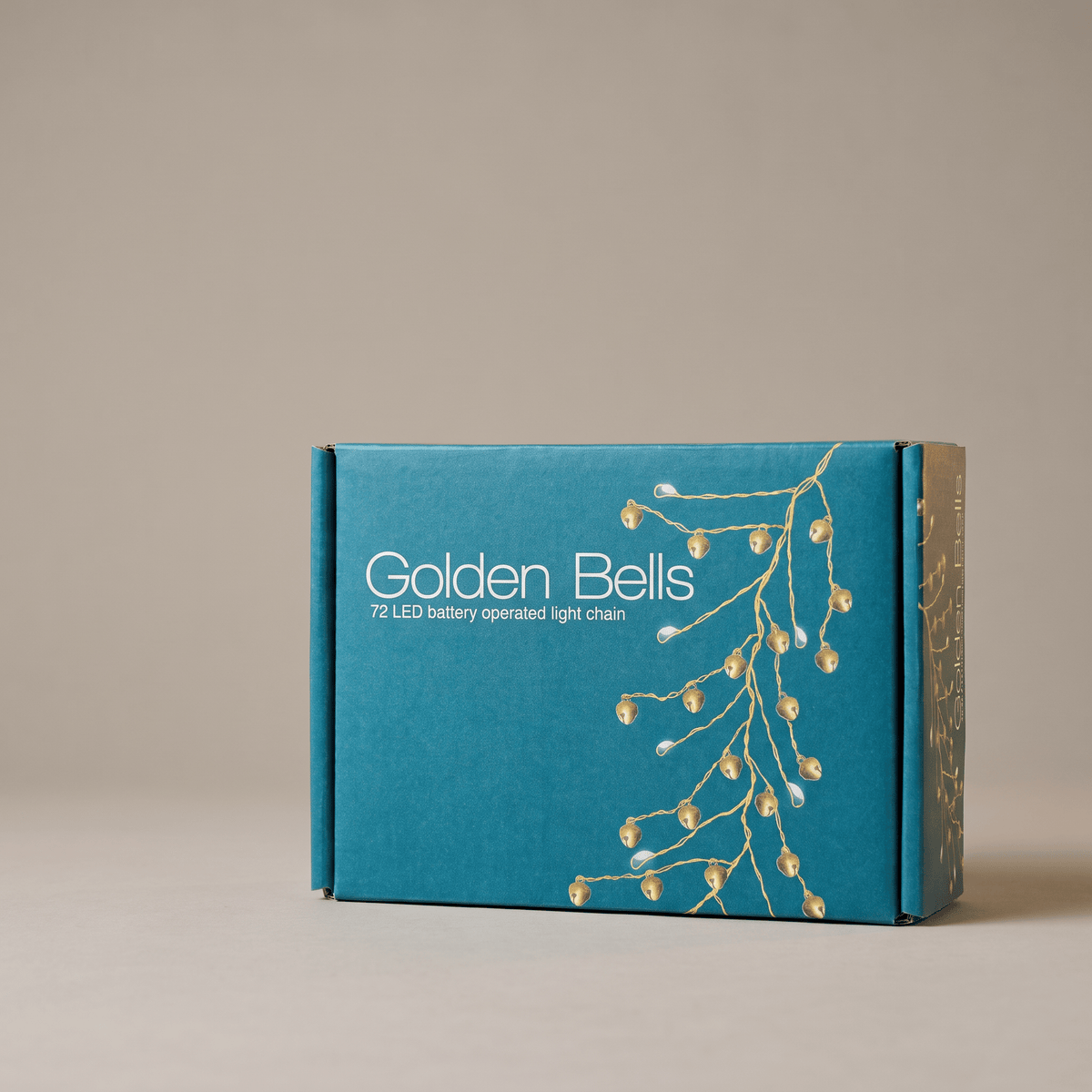 h potter teal-blue product box for Golden Bells 72 LED battery operated light chain, featuring a gold branch illustration and white text, set against a neutral beige background.