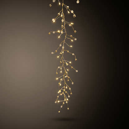 h potter warm white LED fairy string lights arranged in a cascading, branch-like drape against a dark gray gradient background.