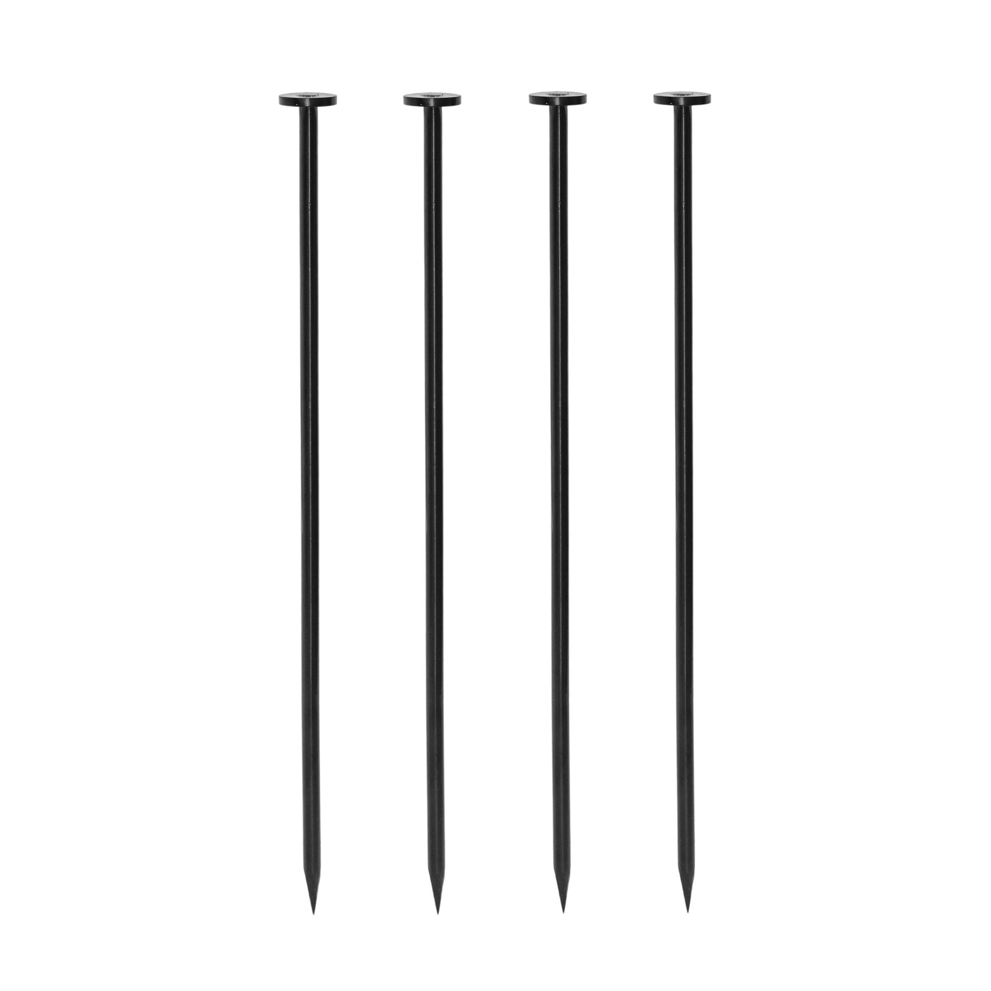Four black metal stakes on a white background