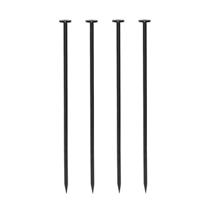 Four black metal stakes on a white background