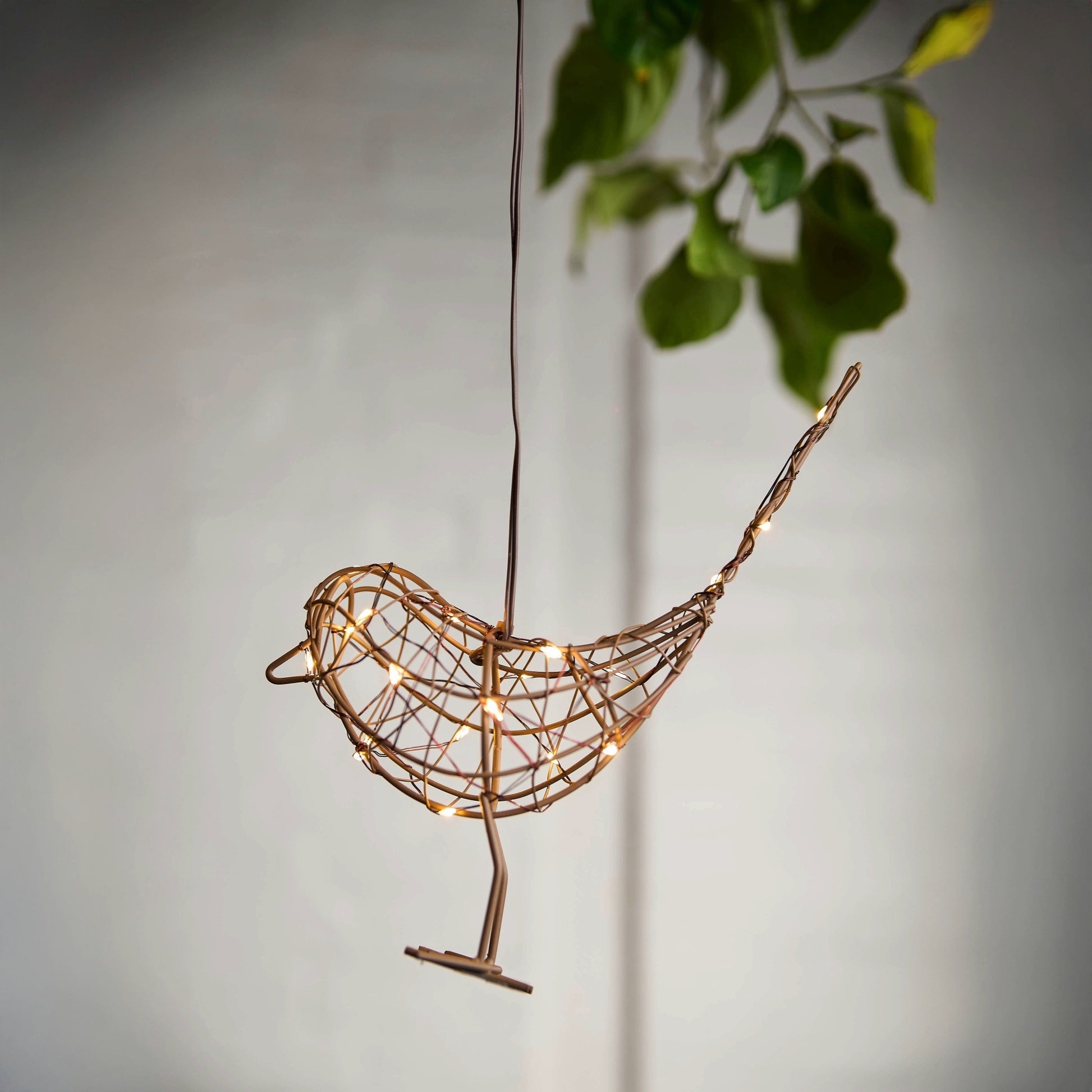 h potter hanging solstice sparrow hanging from a tree