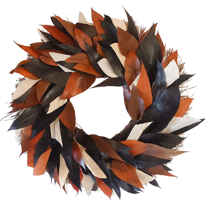 h potter brand decorative autumn leaf wreath made of layered leaves in black, rust orange, tan, and cream, isolated on a white background.