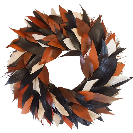 h potter brand decorative autumn leaf wreath made of layered leaves in black, rust orange, tan, and cream, isolated on a white background.