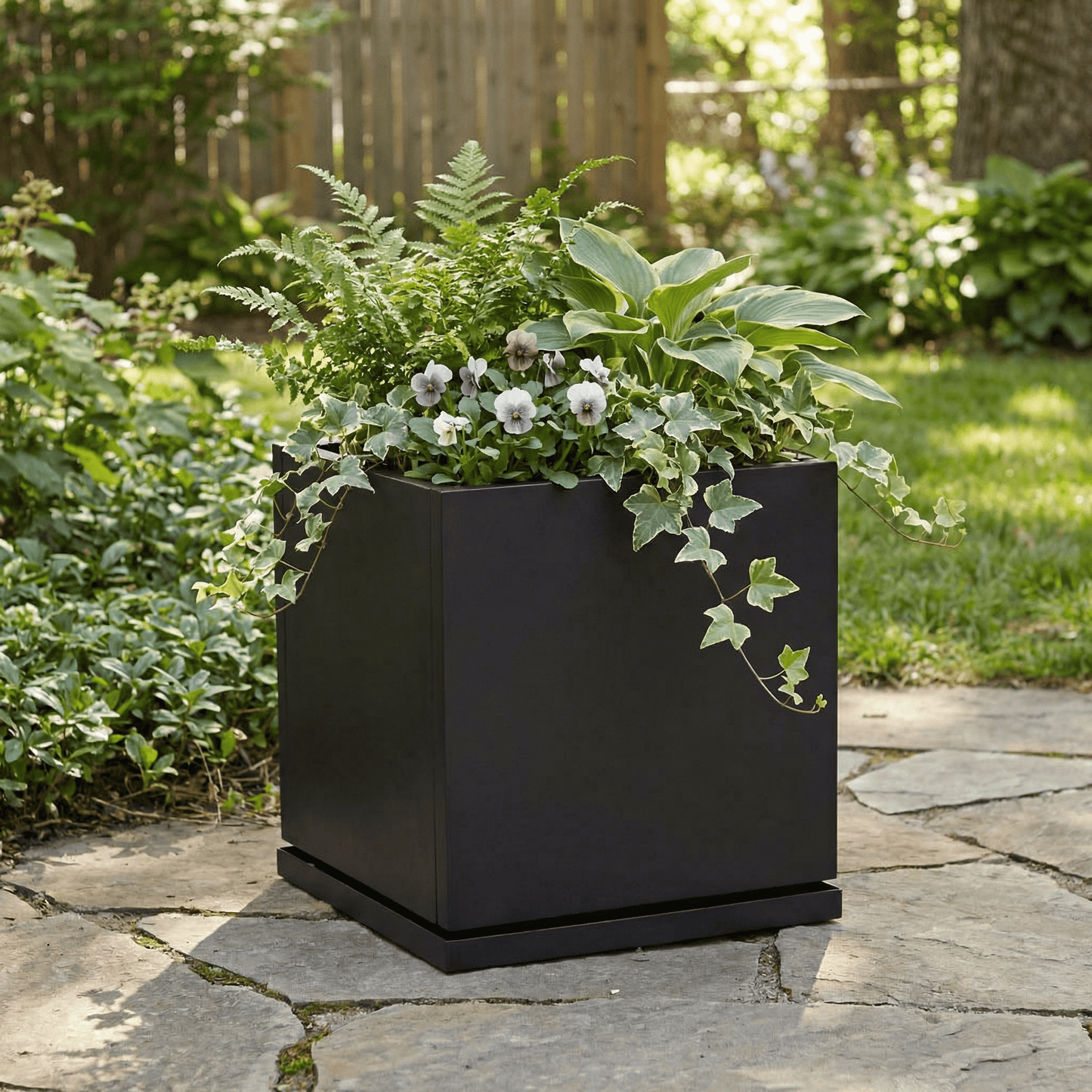 h potter Laurel 20 inch square black planter on stone patio