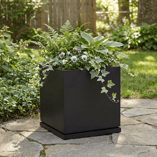 h potter Laurel 20 inch square black planter on stone patio
