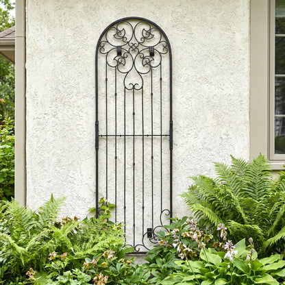 H Potter 8 ft tall legacy wall trellis metal with black finish on a stucco house above landscaped garden
