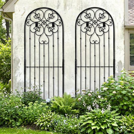H Potter Legacy Wall trellis 8 ft tall black metal on stucco house above landscaped front yard garden