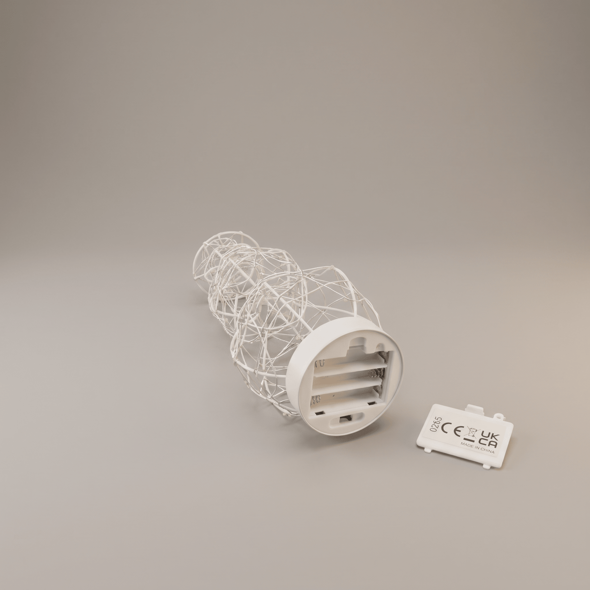 A white snowman with a wire mesh body and a circular base