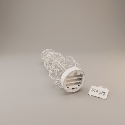 A white snowman with a wire mesh body and a circular base