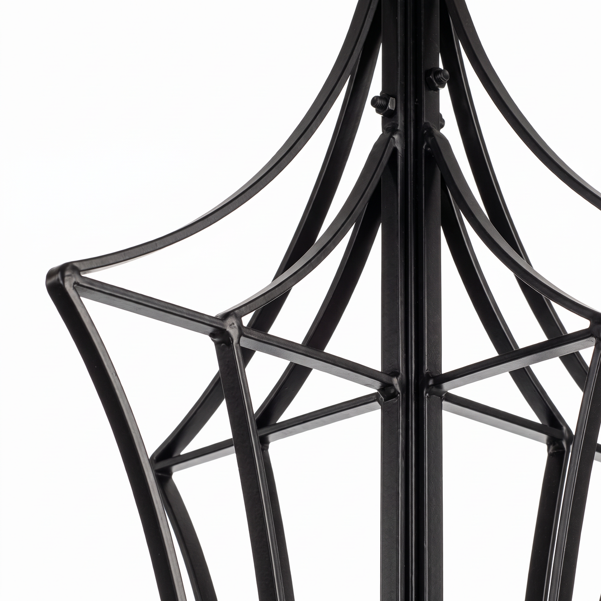 Close-up of Genie black garden obelisk trellis curved iron framework and construction