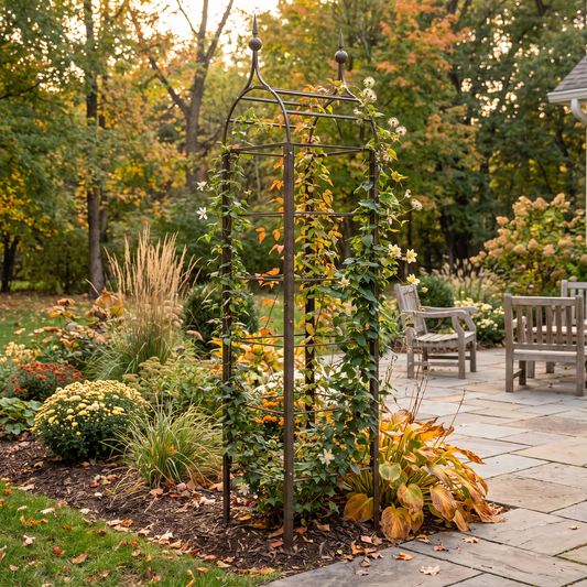 H Potter ogee obelisk metal garden trellis with climbing vines in an autumn garden