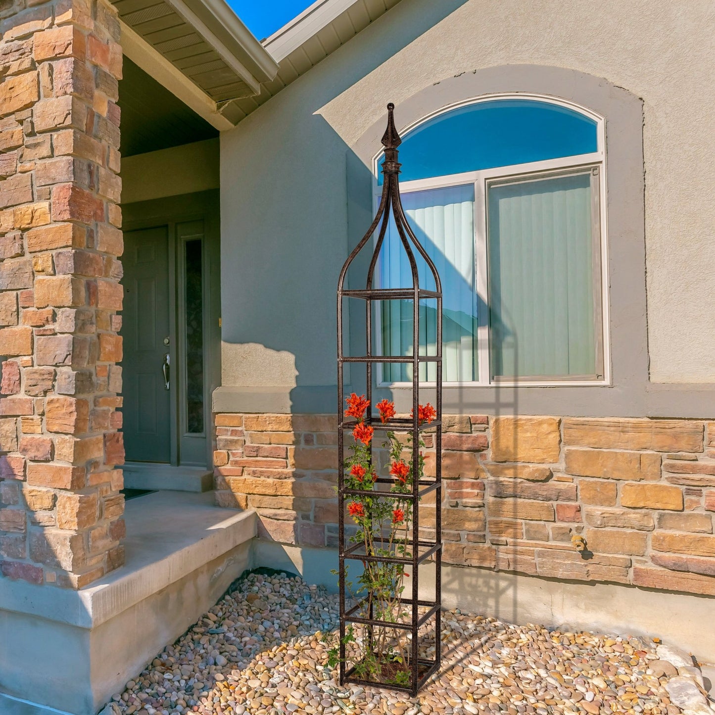 H Potter metal patio planter obelisk trellis installed near home entryway