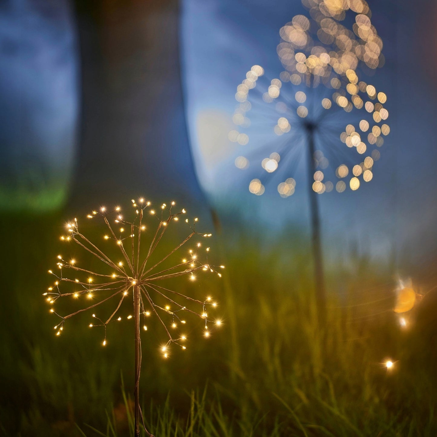 H Potter solar decorative lights resembling dandelions on a blurred natural background