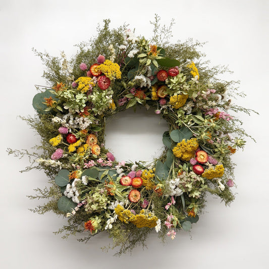Silhouette of H Potter Spring Sunrise dried botanical wreath for indoor spring decor and mantel styling