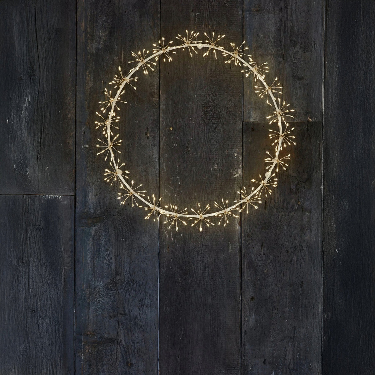 large h potter starlight wreath led lid on a wall