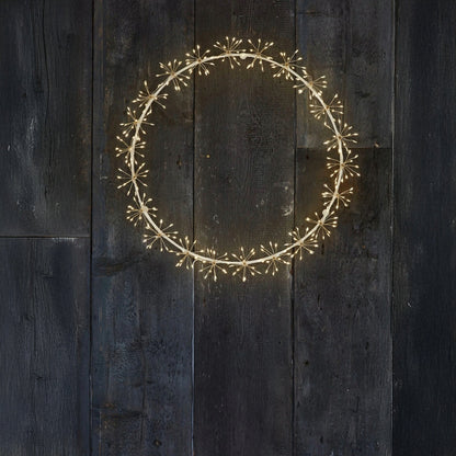 large h potter starlight wreath led lid on a wall