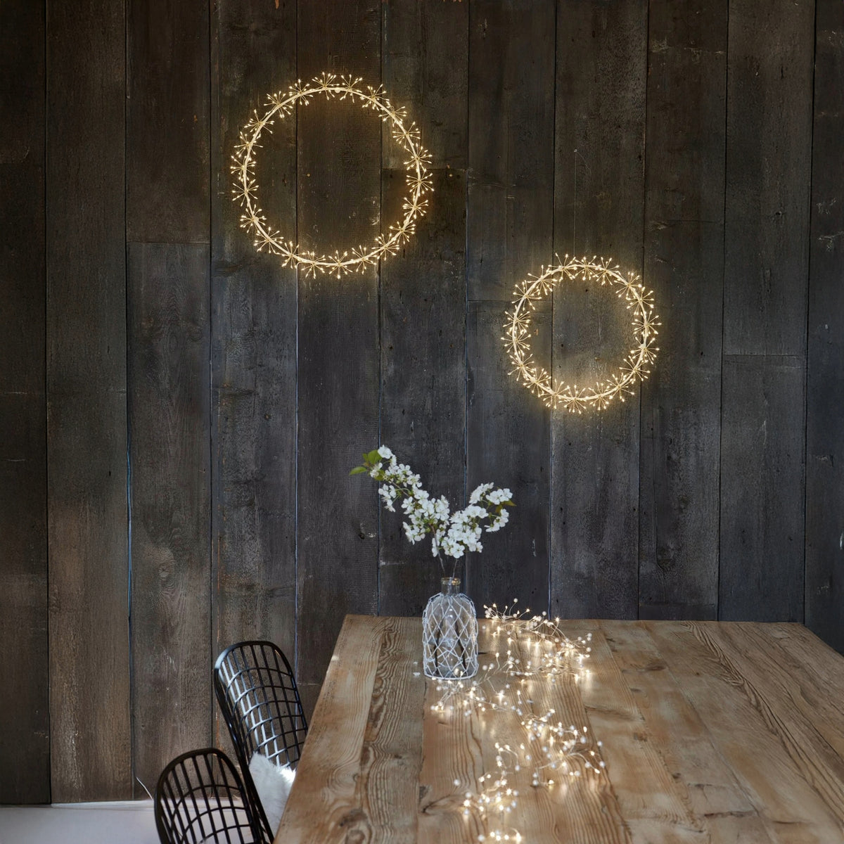 h potter led starlight wreaths on a wooden wall