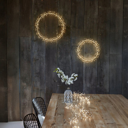 h potter led starlight wreaths on a wooden wall
