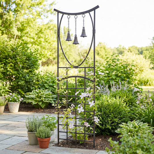 H Potter Steeple Bells Garden Trellis staked in a bed of mulch with clematis