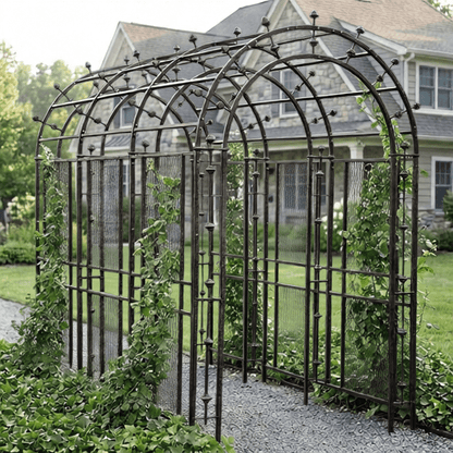 H Potter Stratford large garden arbor trellis tunnel on a rock garden path in a front yard of home