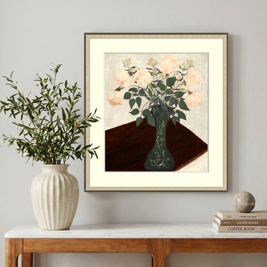 botanical wall art canvas painting above console table with plants and books