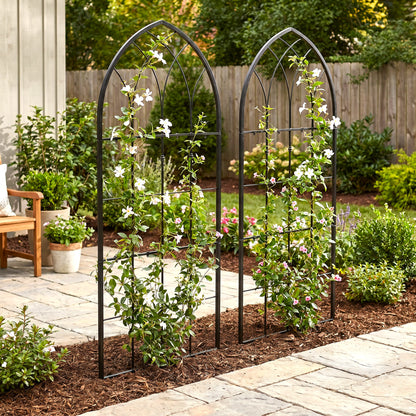 H Potter set of 2 black metal gothic style trellises in garden with flowers off stone patio
