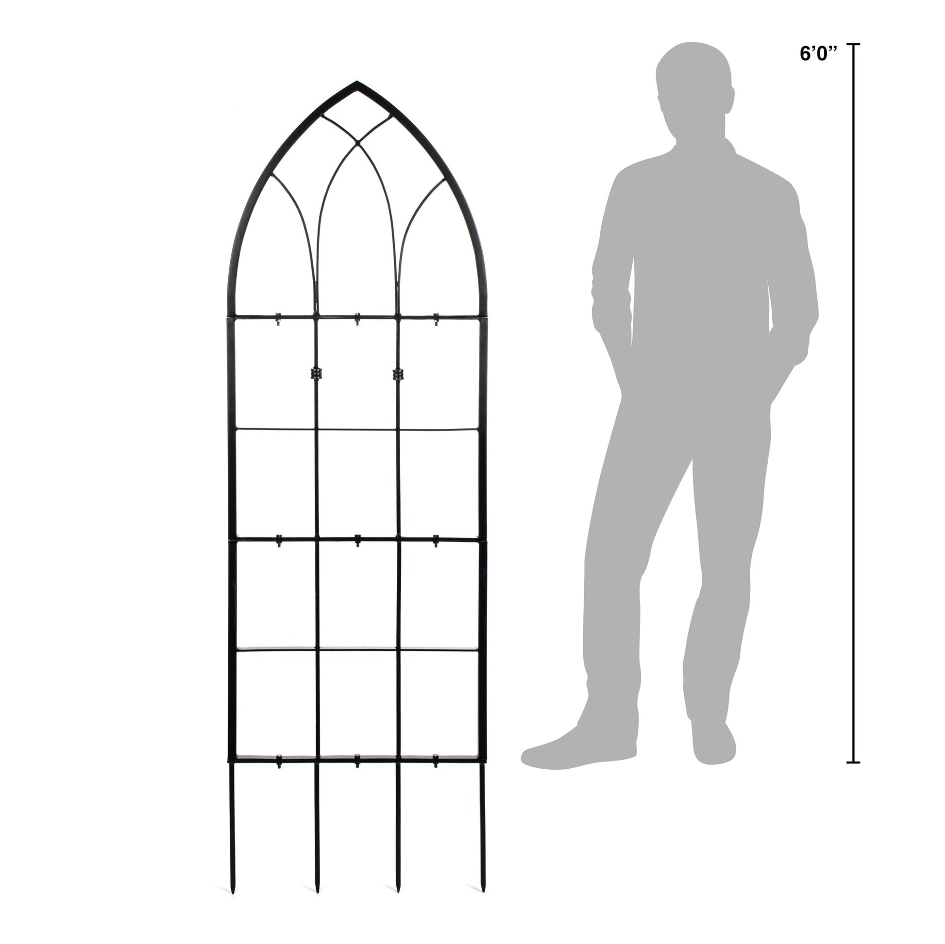Gothic-style metal garden trellis with a person silhouette for scale on a white background